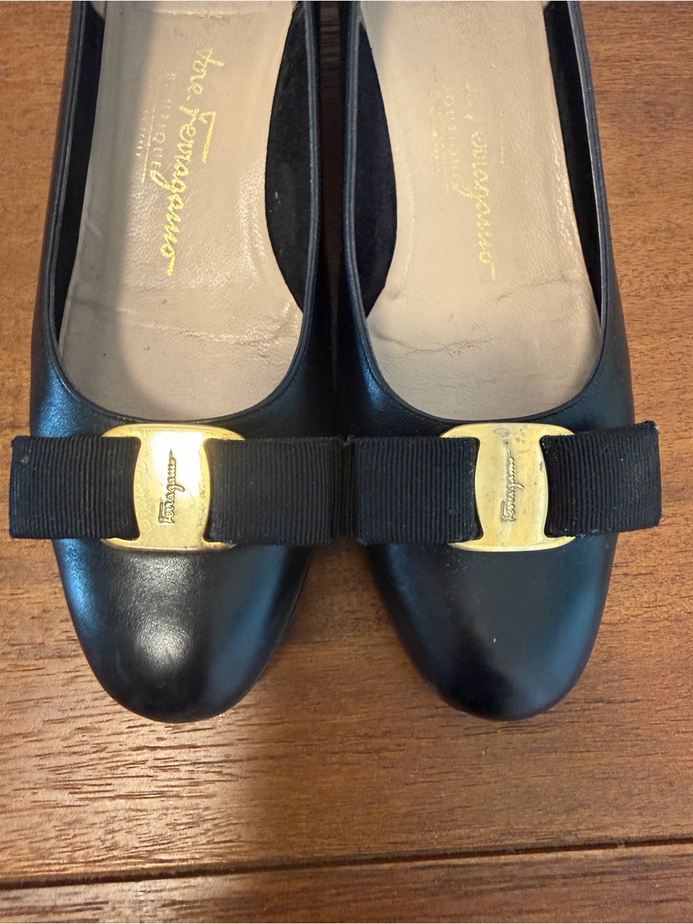 Salvatore Ferragamo Black Leather Vara Bow Flats with Gold Logo Plaques